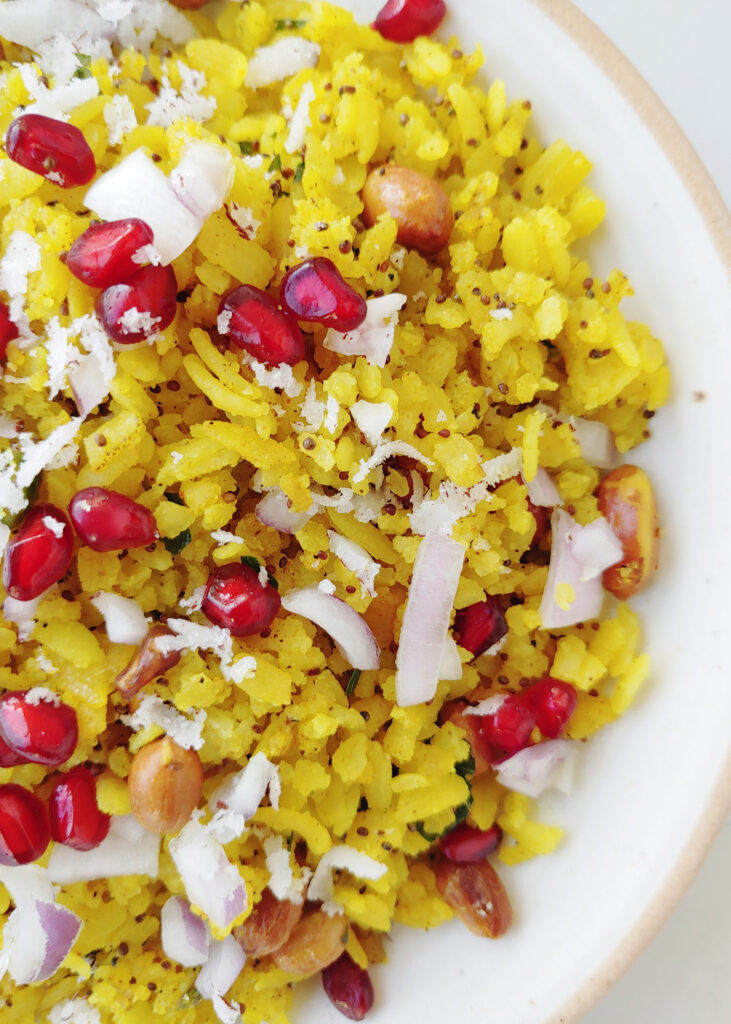 zoomed in photo of poha served in a plate