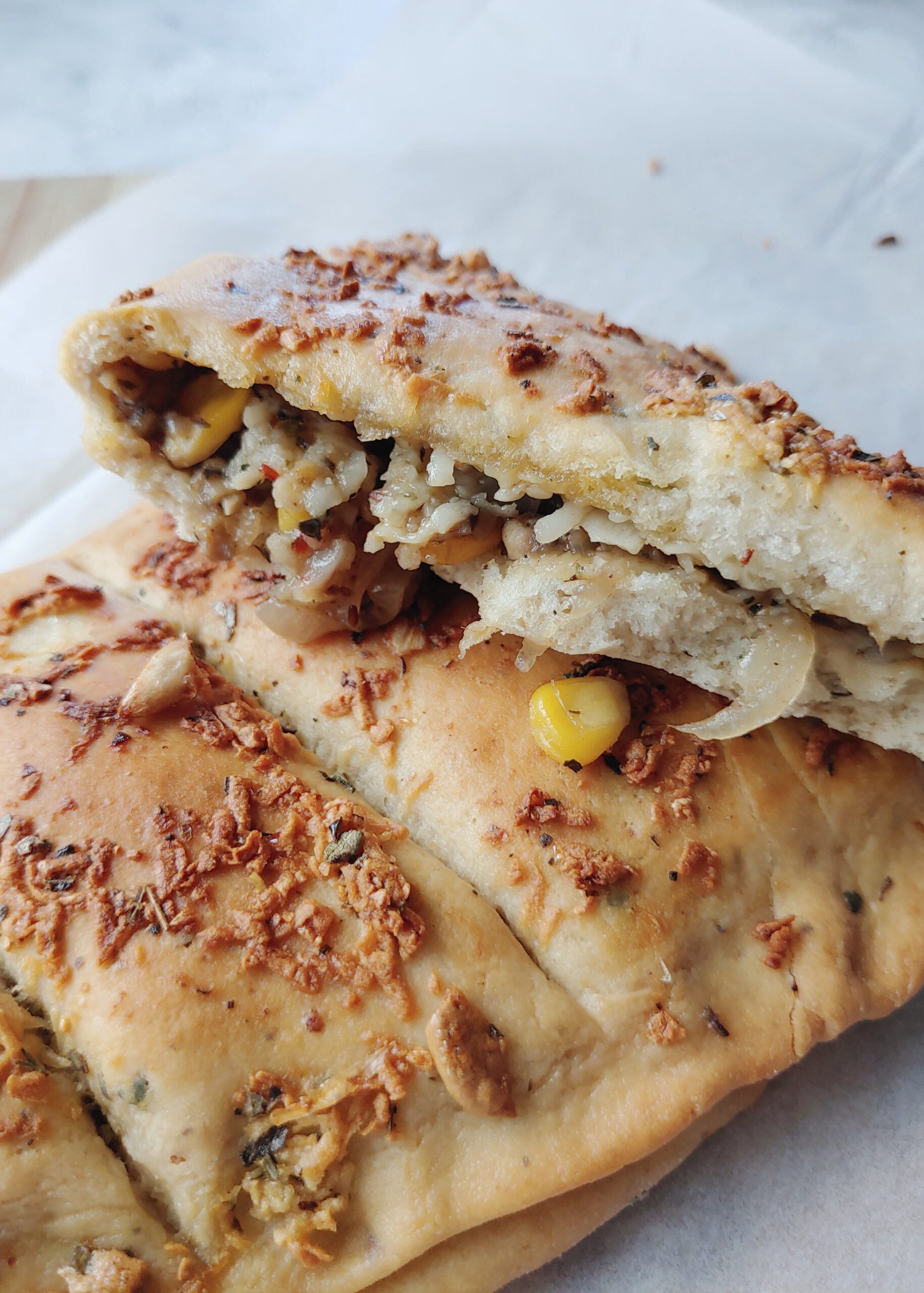 mushroom corn stuffed baked garlic breadstick inside