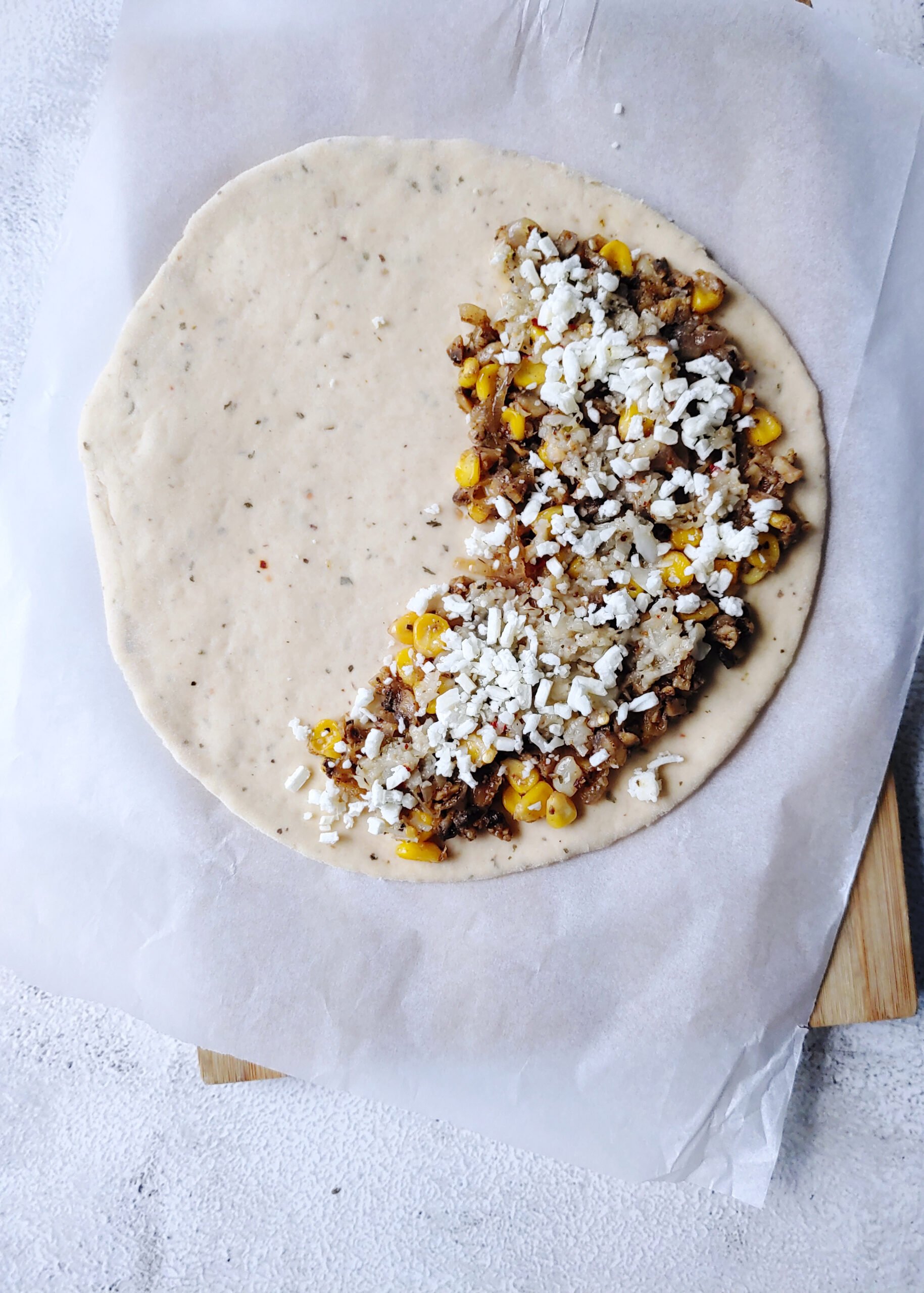 mushroom corn cheese stuffing spread before baking   