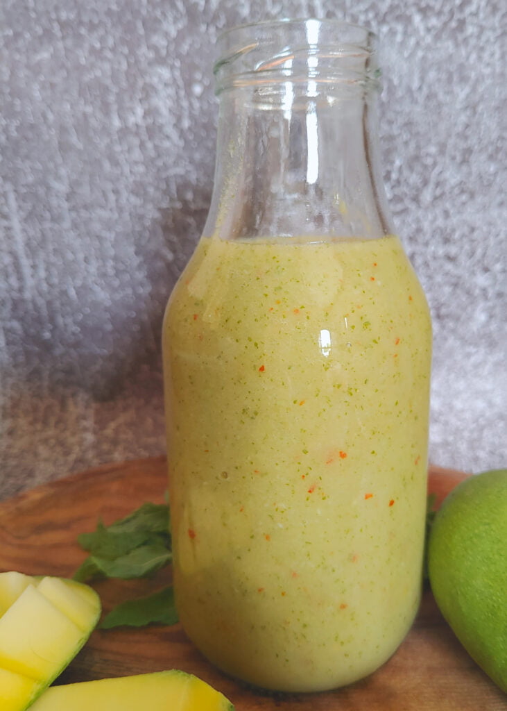 raw mango chutney in a  bottle