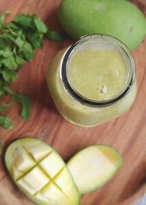 raw mango sauce in a bottle top photo
