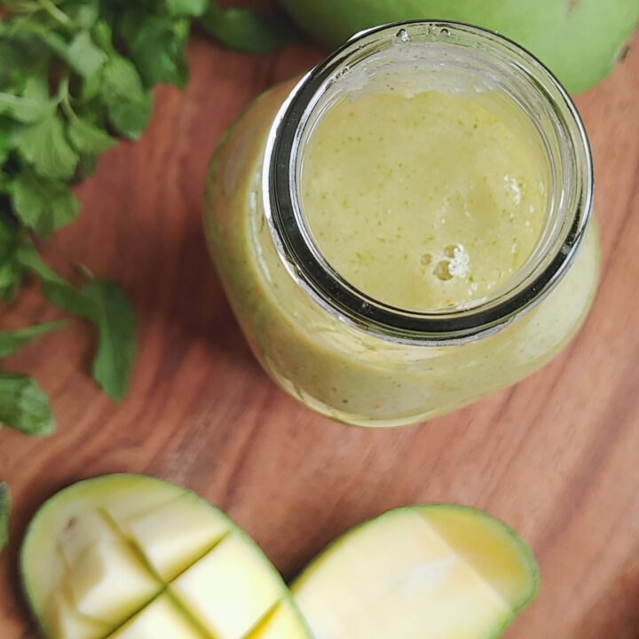 raw mango sauce in a bottle top photo