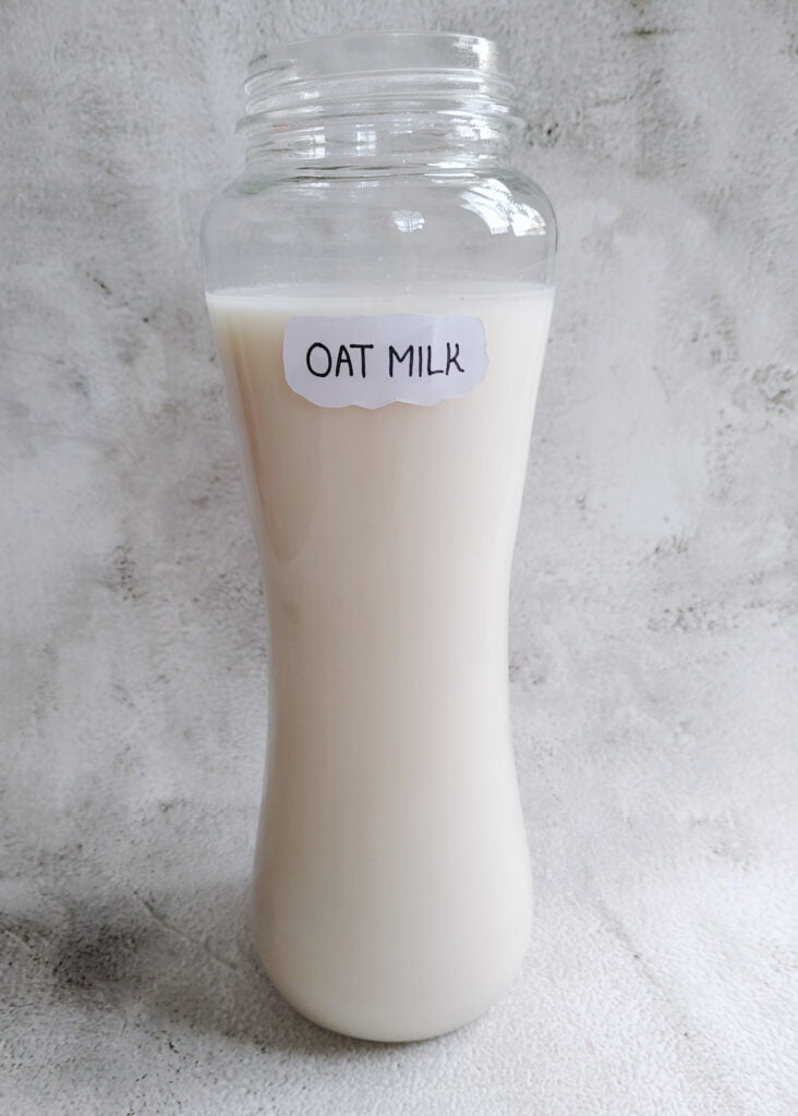 oat milk in a glass bottle
