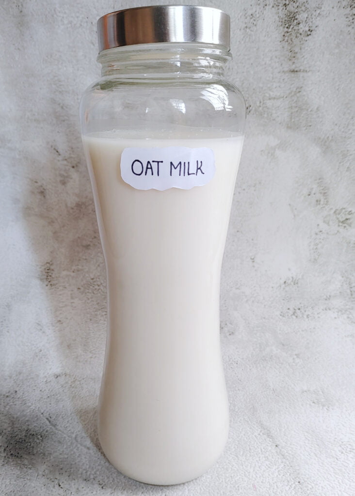 oat milk in a sealed glass bottle