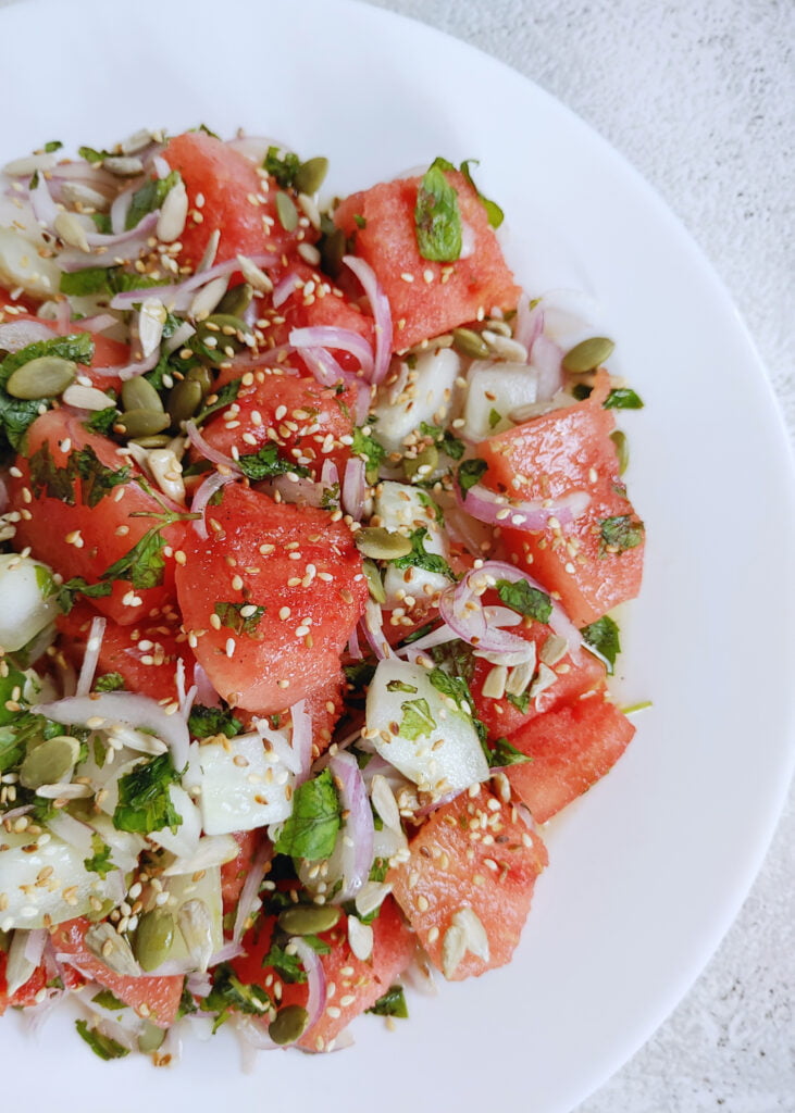 watermelon cucumber salad in a plate - photo taken from close_2