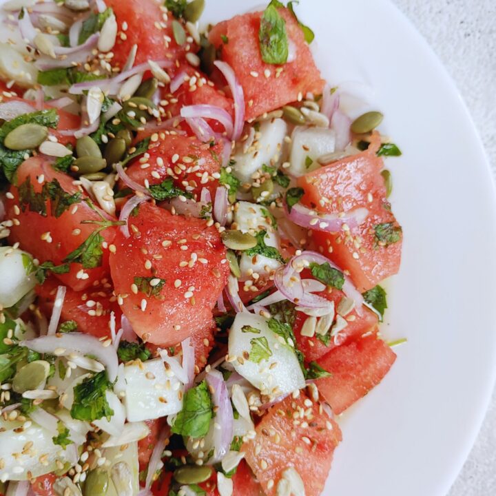 watermelon cucumber salad in a plate - photo taken from close_2