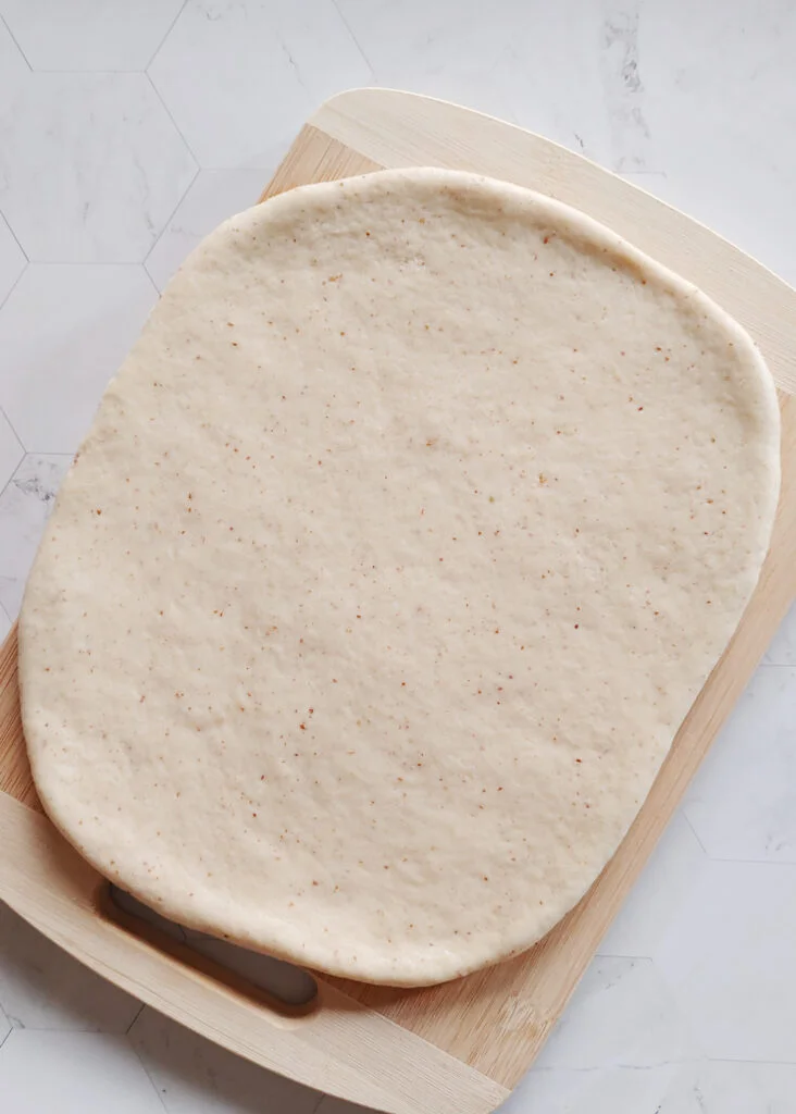 cinnamon roll cookies dough flattened out