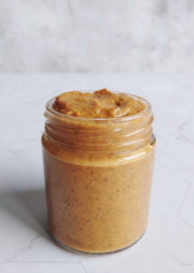 south indian style tomato onion chutney served in a glass jar featured image