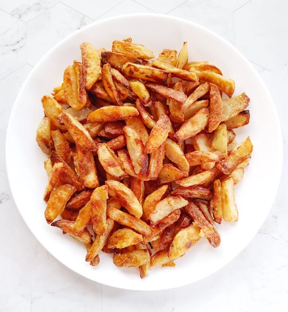 baked potato fries served in a plate
