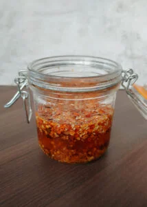 featured image of chilli oil in a sealed glass jar