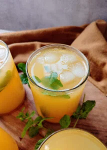 featured image of orange lemon iced green tea poured into glasses