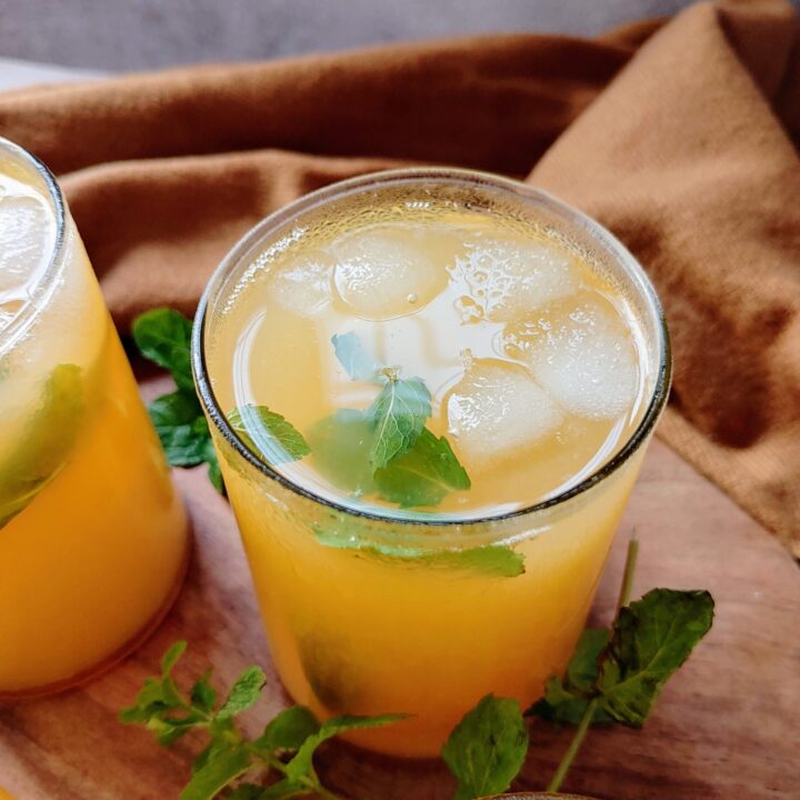featured image of orange lemon iced green tea poured into glasses
