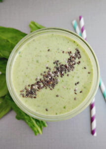 green smoothie in a glass photo taken from top
