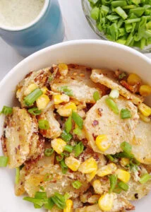 Roasted Potato and Corn Salad in Pumpkin Seed Dressing Served in a Bowl