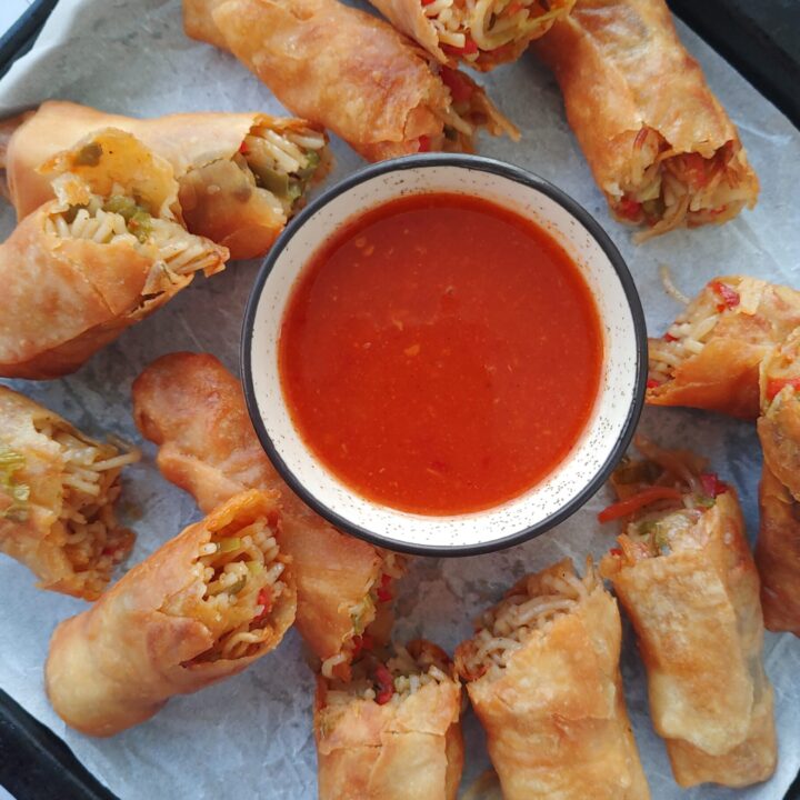 vegetable spring rolls served with a dipping sauce