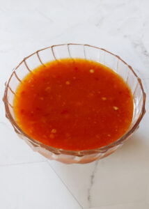spring rolls dipping sauce served in a bowl