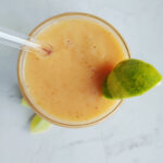 photo taken from top of papaya smoothie in a glass