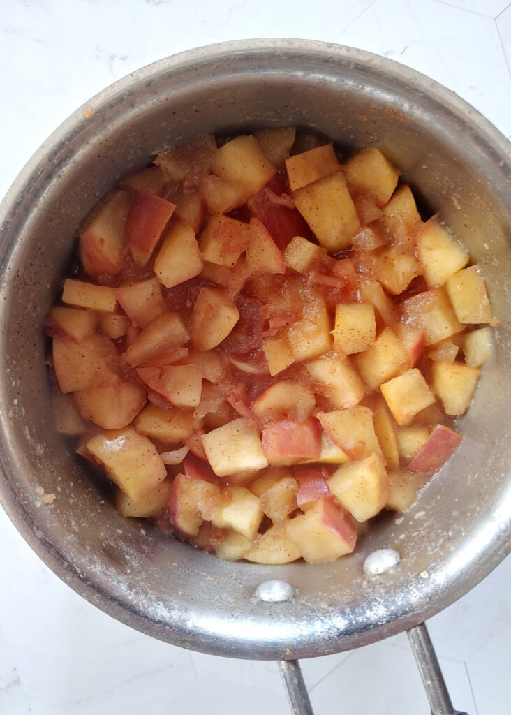 apples and other ingredients boiled in a saucepan