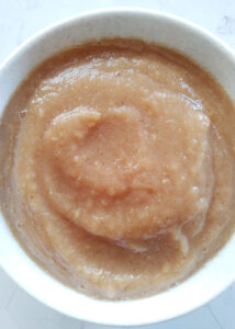 applesauce sweetened with dates served in a bowl