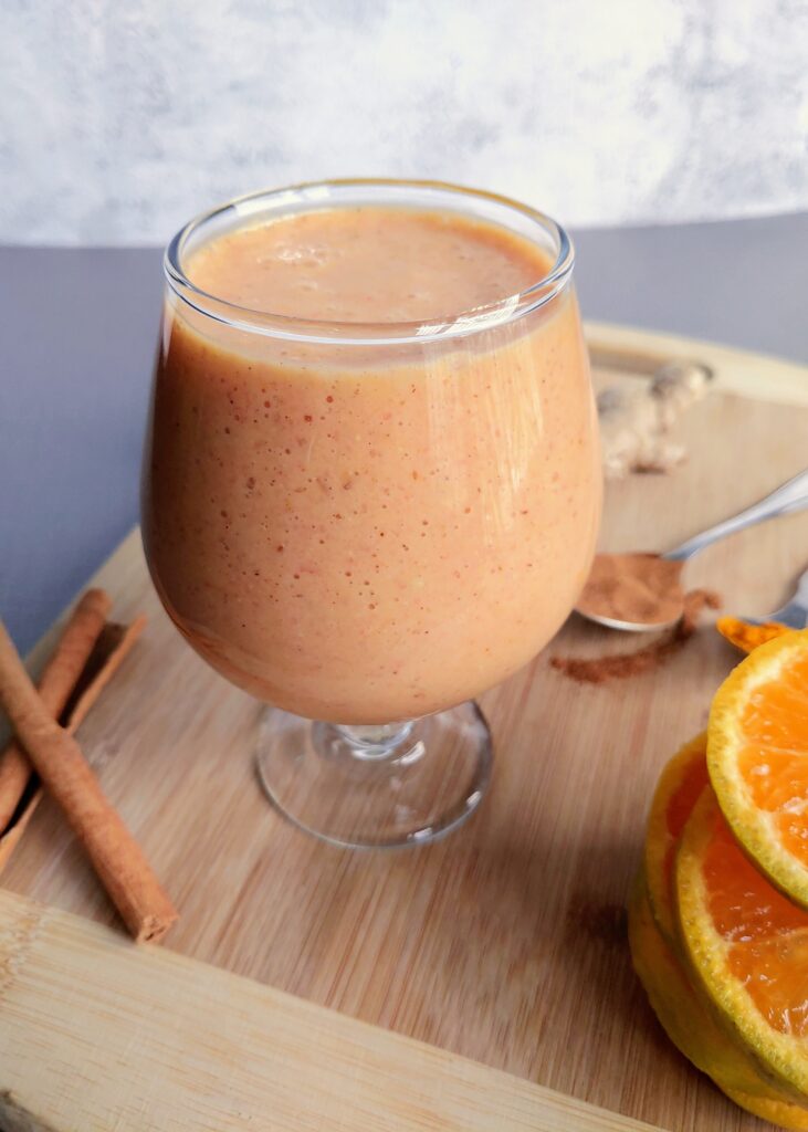 orange smoothie served in a glass