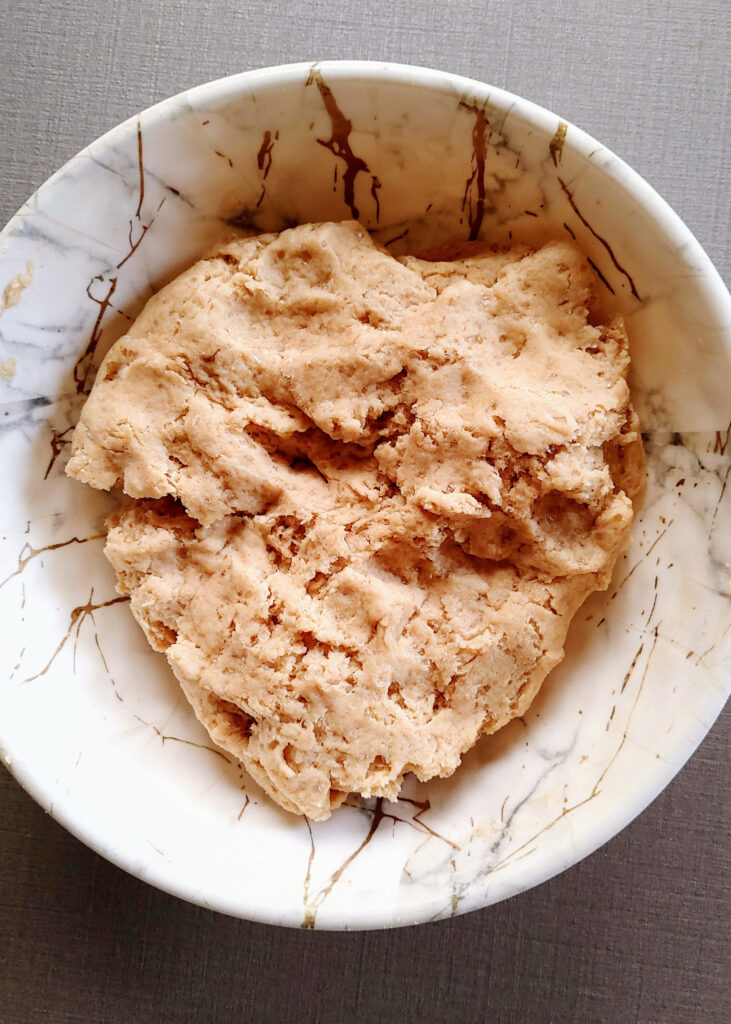 egg-free whole-wheat scones dough kneaded in a bowl