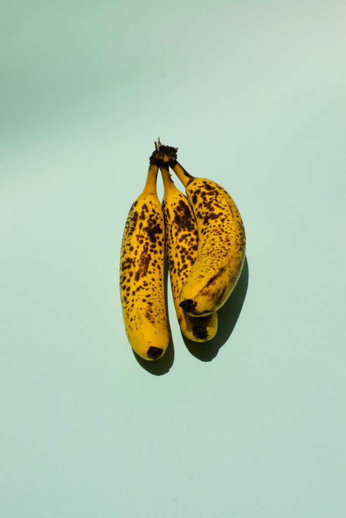 ripened bananas on a surface