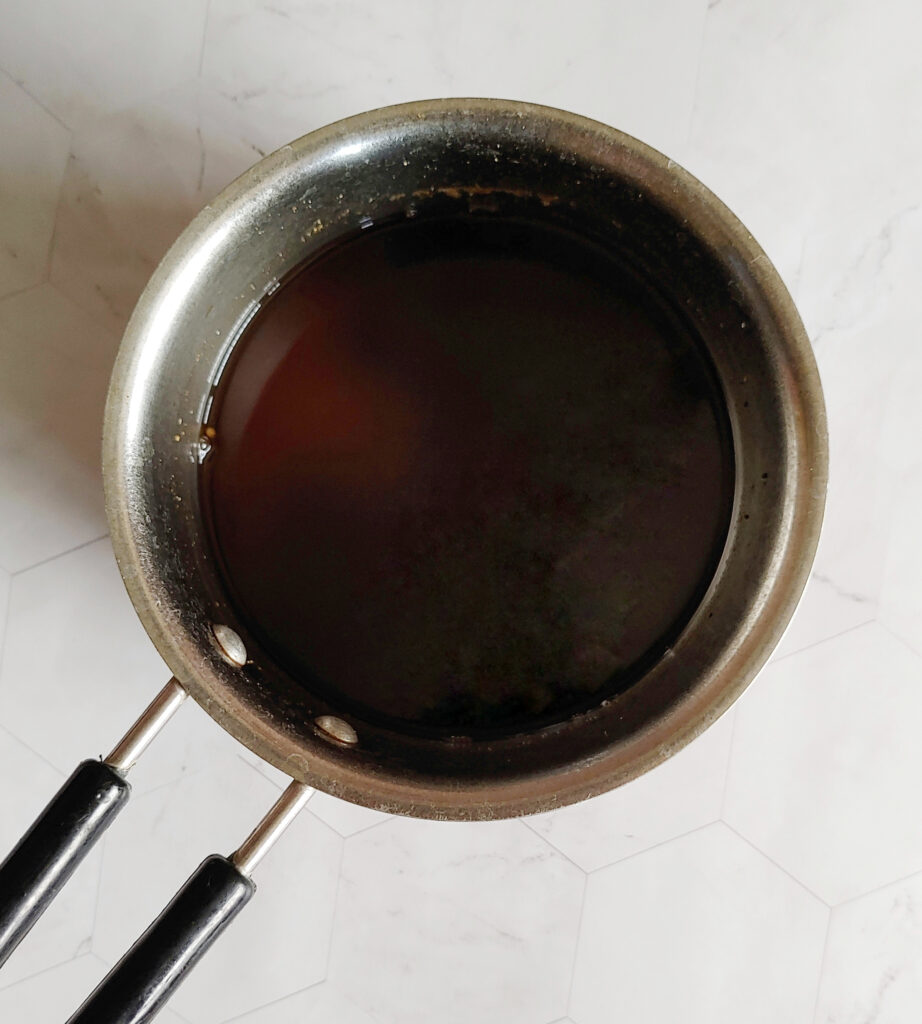 boiled black tea leaves concoction in a saucepan