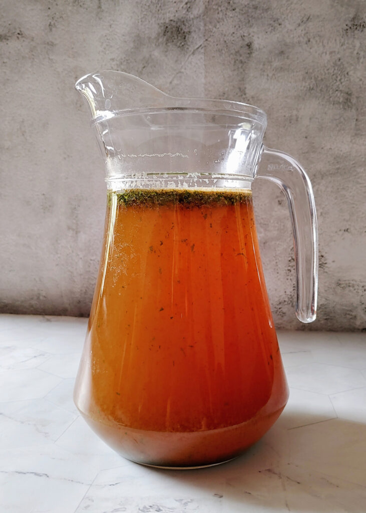 mint lemon iced tea in a glass jug