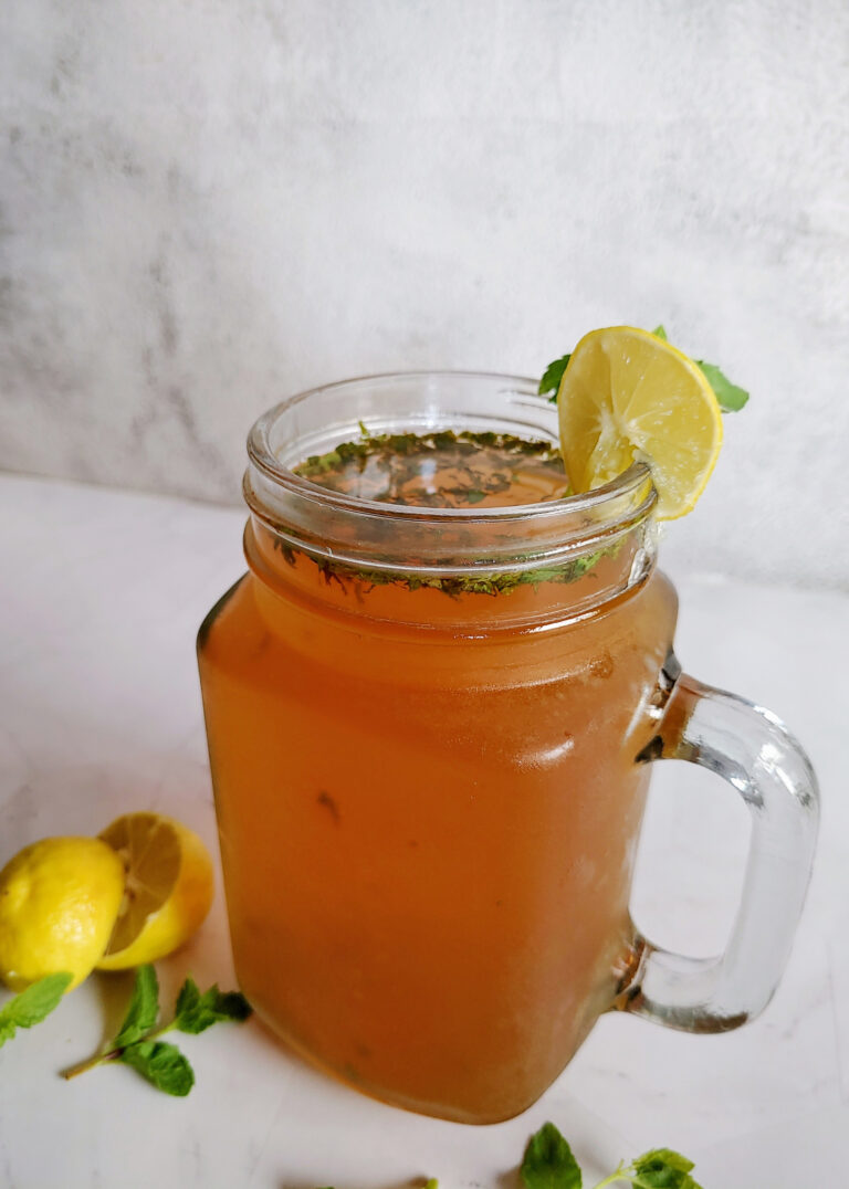 mint lemon iced tea served in a glass jar