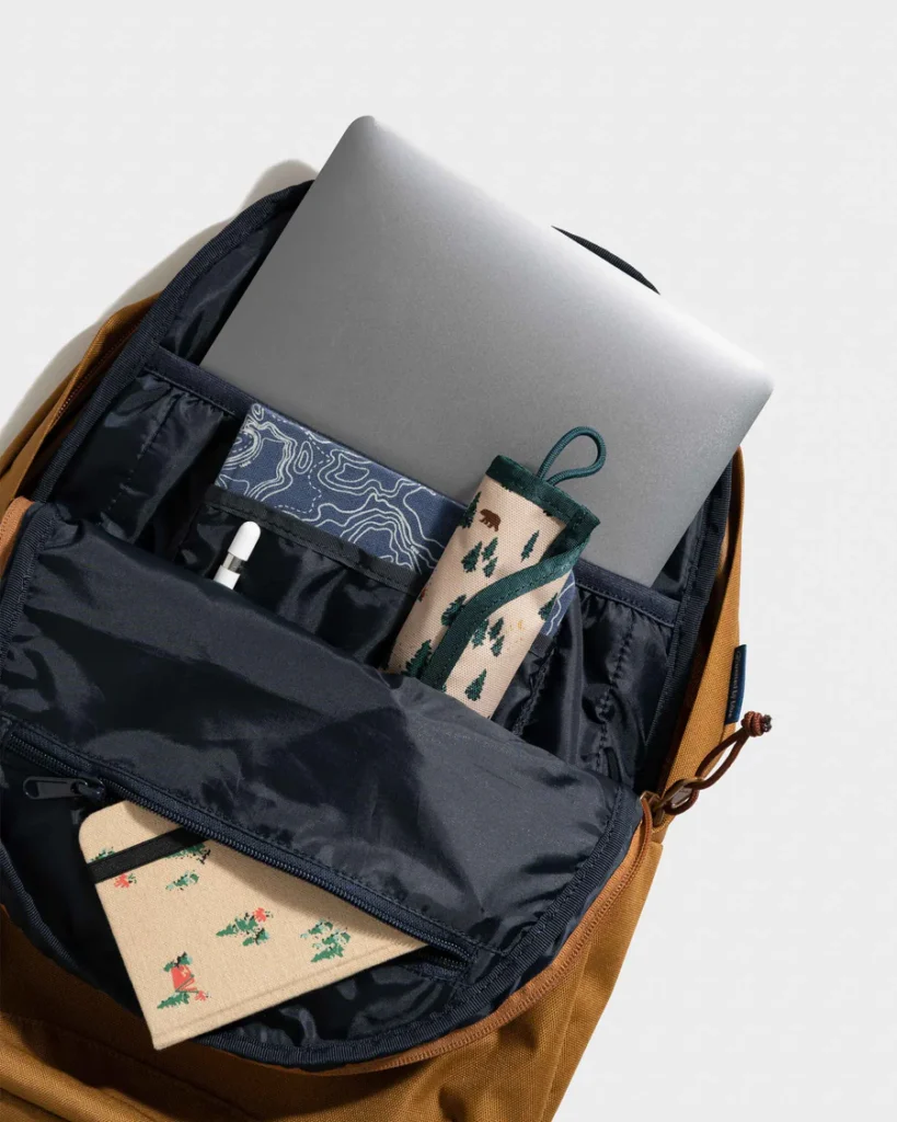 united by blue camel r-evolution commuter backpack inside with books water bottle