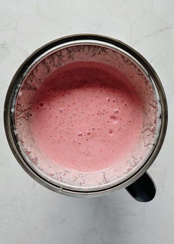 strawberry smoothie blended in a blender